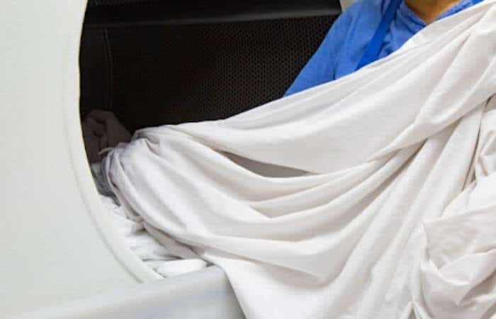 In the dryer, linen might shrink by a maximum of 5%