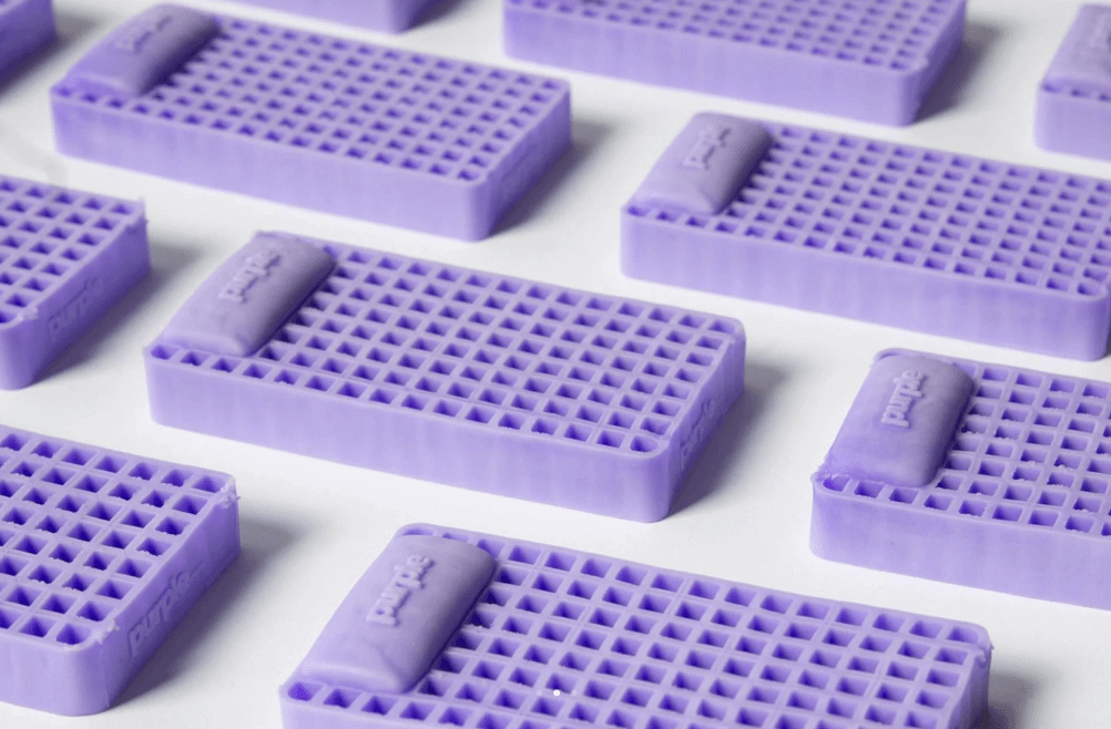 The Purple mattress is designed with a grid of cleverly-cut square voids.